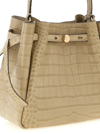 Small Bucket Shoulder Bag by Tory Burch for women in croc skin bos taurus suede calf leather beige, gold & print features a effortless chic silhouette with a secure magnetic, ample , and versatile shoulder-strap, handle & adjustable-strap for a effortless chic finish.