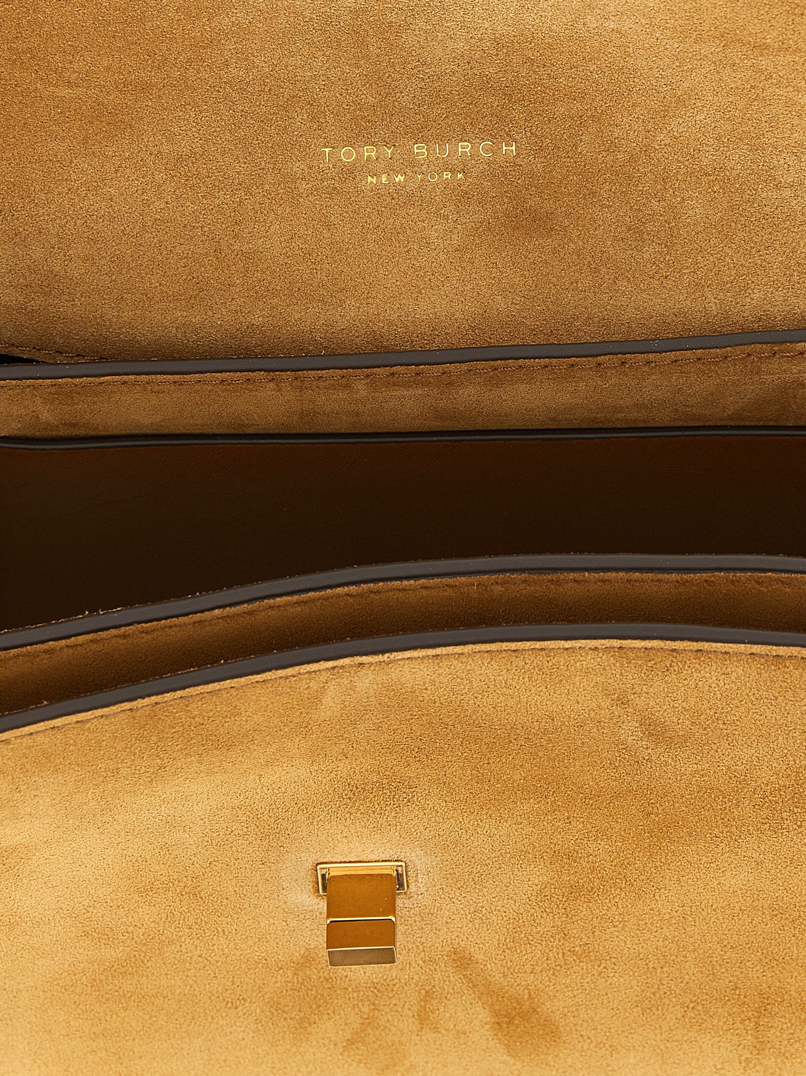 Shoulder Flap Bag by Tory Burch for women in suede calfskin leather brown & gold features an effortlessly chic silhouette with a secure flap, ample , and versatile shoulder-strap for effortlessly chic everyday luxury.