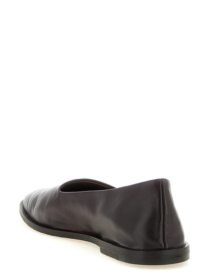 Ballet Slippers Flat Shoes by Marsell for women in calfskin leather brown showcases a dynamic silhouette, artfully capturing Women's Calfskin Leather Ballet Slippers Flat Shoes through its distinctive and elegant almond toe style.
