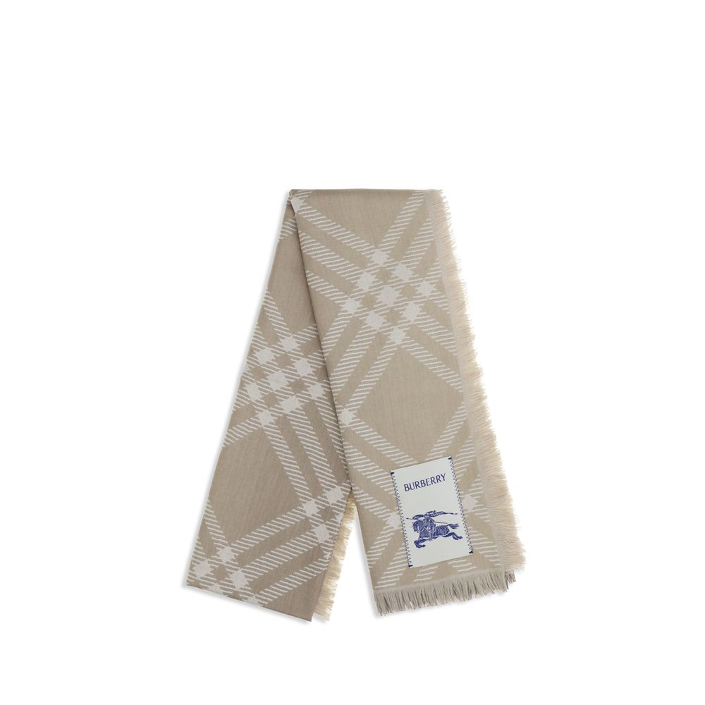 Scarf by Burberry for women in wool & silk beige & patterned presents a effortlessly chic silhouette, artfully capturing the essence of the effortlessly chic Wool & Silk Scarf design for a sophisticated look.