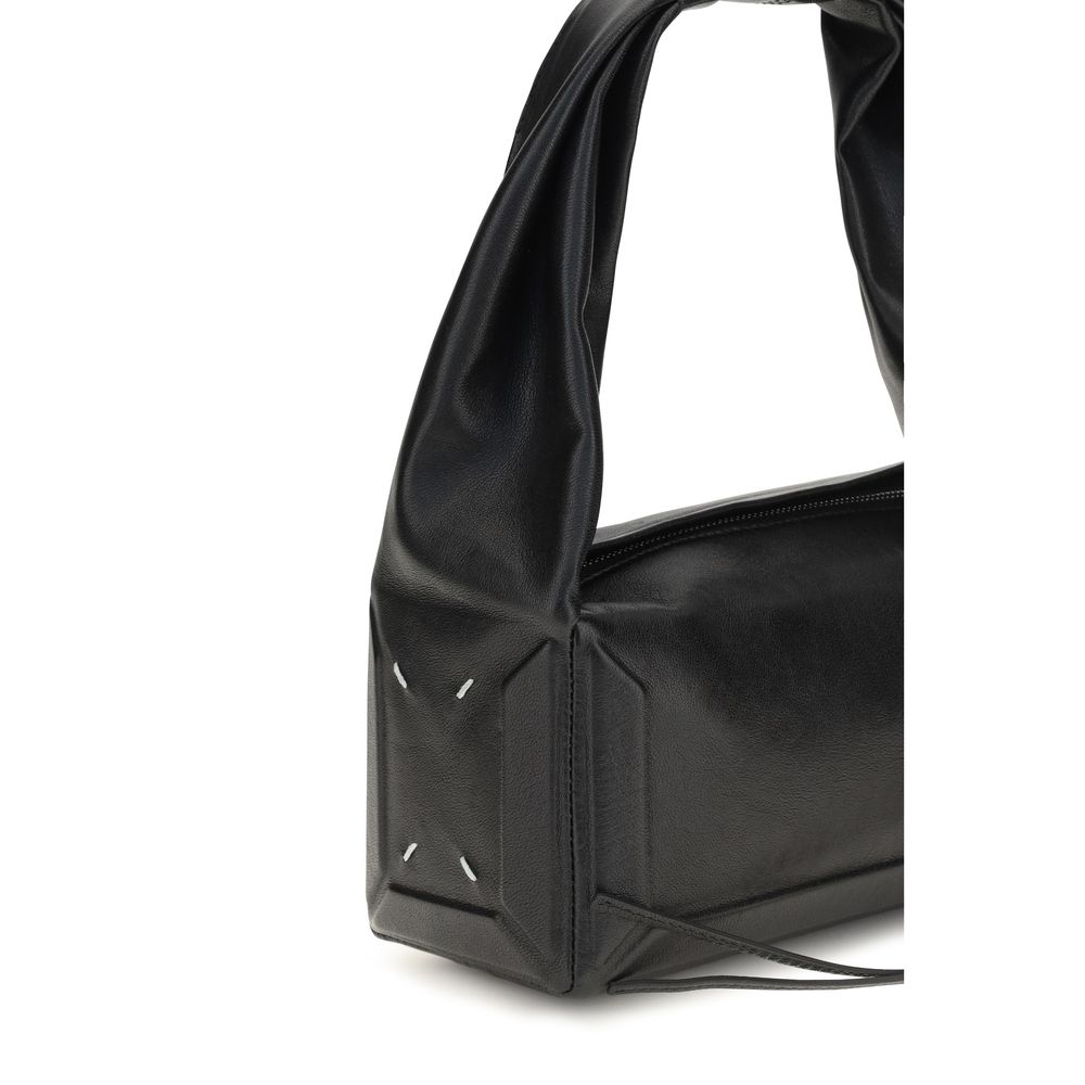 Small East West Shoulder Bag by Maison Margiela for women in leather black, white & signature features a effortless sophistication silhouette, secured by a zipper with ample and versatile shoulder-strap for a effortless sophistication finish.