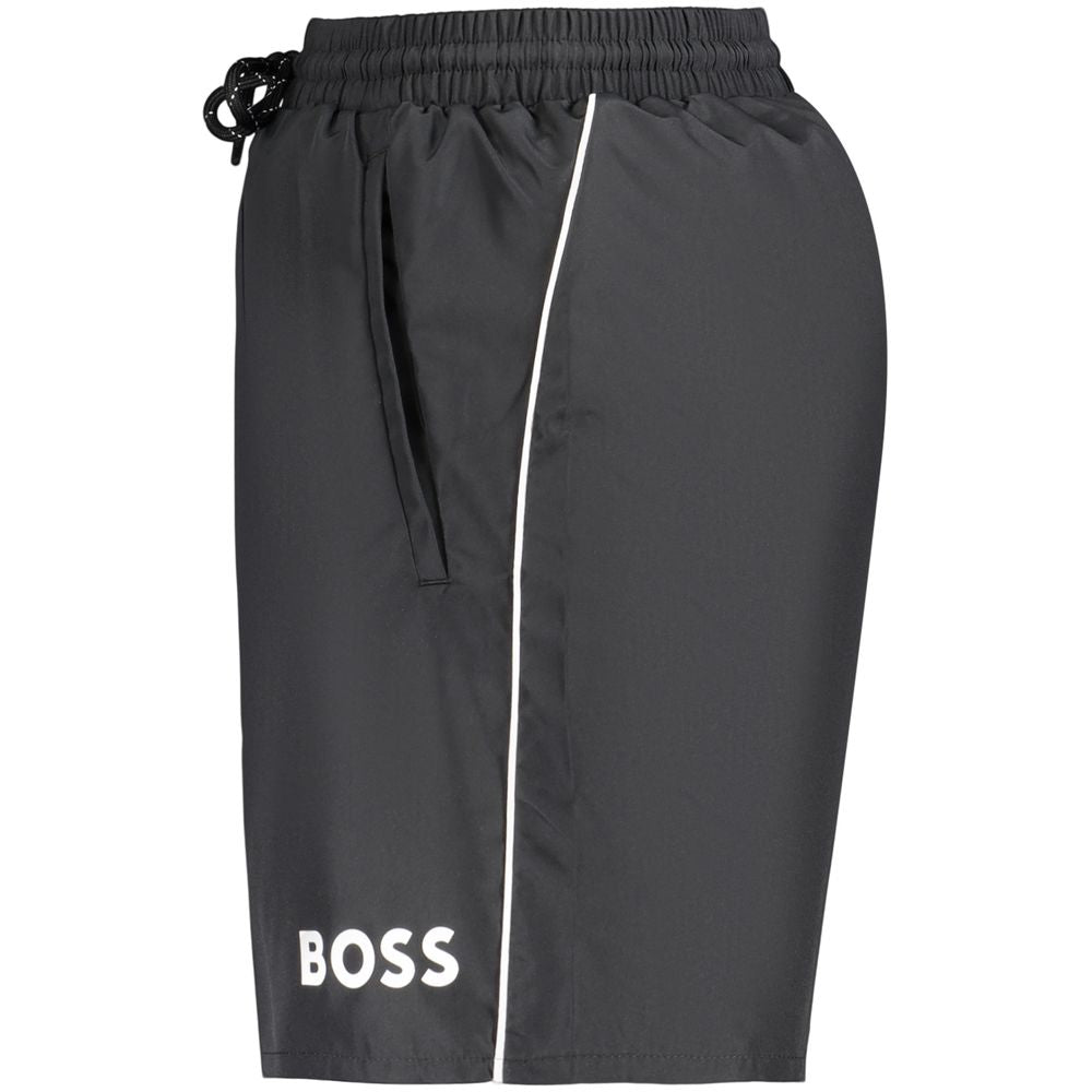 Swim Shorts by Hugo Boss for men in polyester black & print features a resort ready silhouette, perfectly capturing the resort ready aesthetic of Waves Men's Polyester Swim Shorts with a resort ready finish.
