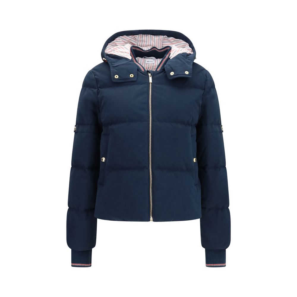 Hooded Puffer Jacket by Thom Browne for women in cotton polyester blue & gold features a city-ready silhouette, detailed with pockets, hooded & insulated and a city-ready hooded neckline.