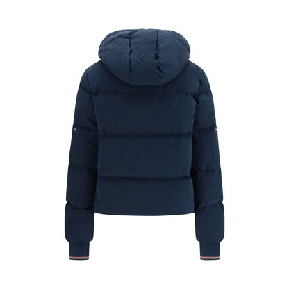 Hooded Puffer Jacket by Thom Browne for women in cotton polyester blue & gold presents a effortlessly chic silhouette, showcasing a sophisticated hooded neckline and premium pockets, hooded & insulated for a truly effortlessly chic finish.