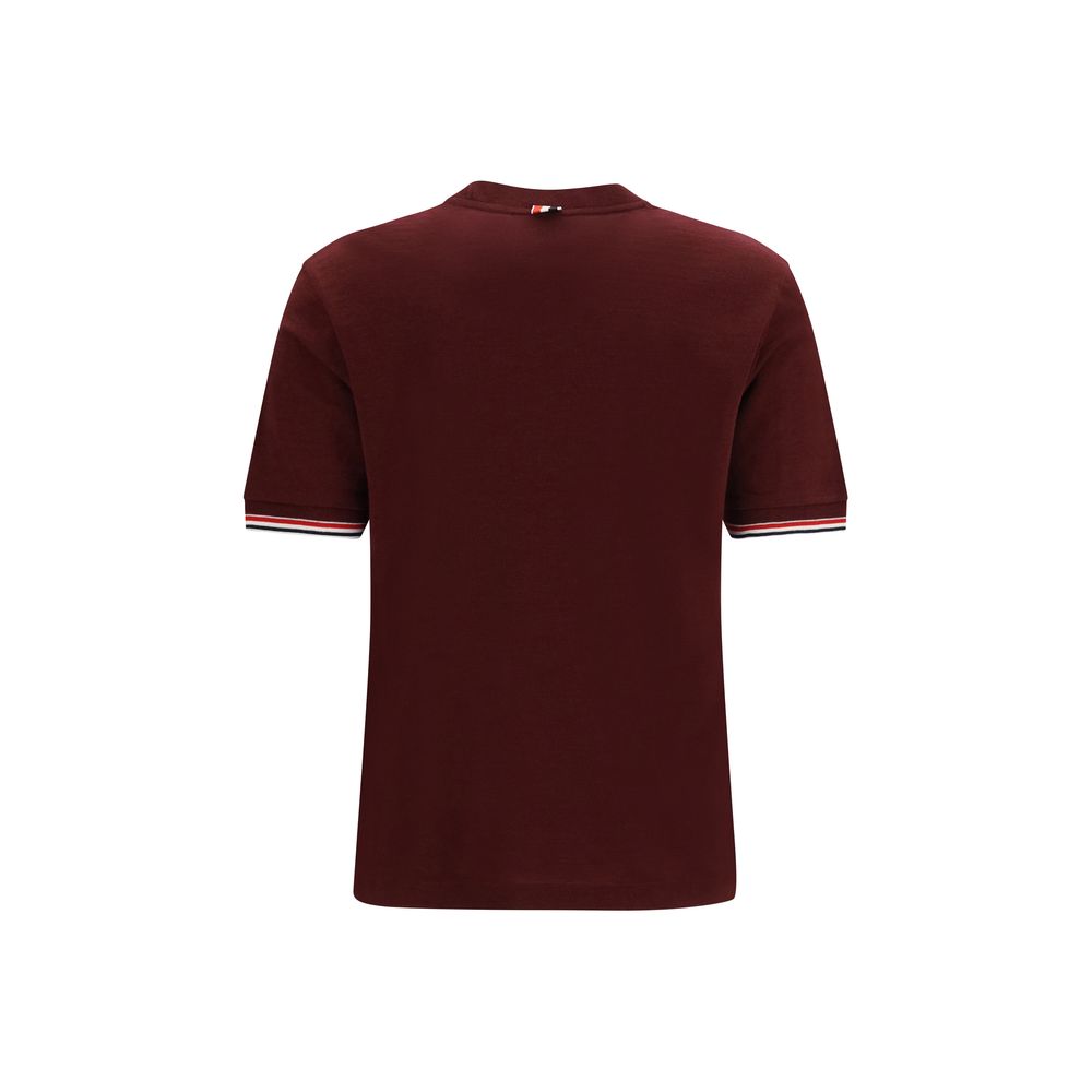 T-Shirt by Thom Browne for women in merino wool bordeaux showcases a dramatic silhouette, elegantly detailed with a dramatic crew neckline and for a truly dramatic finish.
