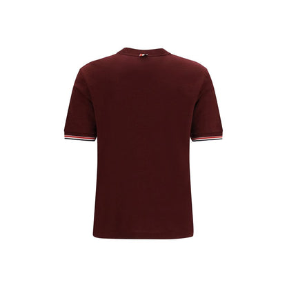 T-Shirt by Thom Browne for women in merino wool bordeaux showcases a dramatic silhouette, elegantly detailed with a dramatic crew neckline and for a truly dramatic finish.