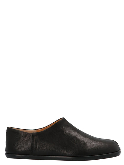 Ballet Flat Shoes by Maison Margiela for women in lamb leather black & signature showcases a enchanting silhouette as part of the Women's Lamb Leather Ballet Flat Shoes collection, defined by a enchanting and for a enchanting look.