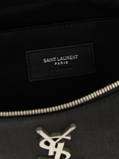Fanny Pack Messenger Bag by Saint Laurent for men in lamb leather & polyester black, silver & monogram features an fashionable Cassandre Lamb leather & Polyester Fanny Pack Messenger Bag design with a fashionable buckle, ample cardholder, and versatile crossbody-strap, shoulder-strap, adjustable-strap & belt-strap for a sophisticated finish.