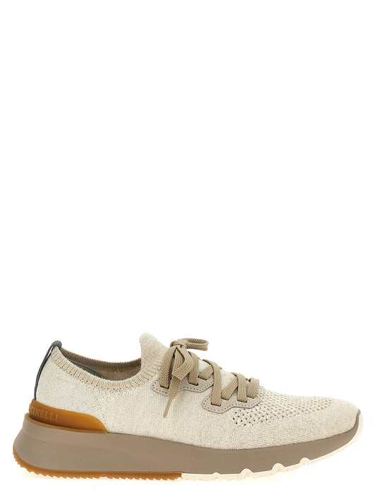 Sneakers by Brunello Cucinelli for men in stretch polyamide cotton beige presents a sumptuous silhouette, artfully capturing the essence of the Men's Low Top Slip On Stretch Polyamide Cotton Sneakers with its sumptuous low-top slip-on style design.
