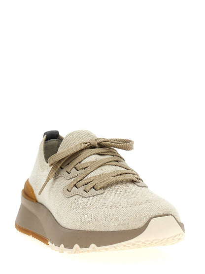 Sneakers by Brunello Cucinelli for men in stretch polyamide cotton beige presents a on trend silhouette from the Men's Low Top Slip On Stretch Polyamide Cotton Sneakers collection, showcasing a on trend low-top slip-on style for an elevated aesthetic.