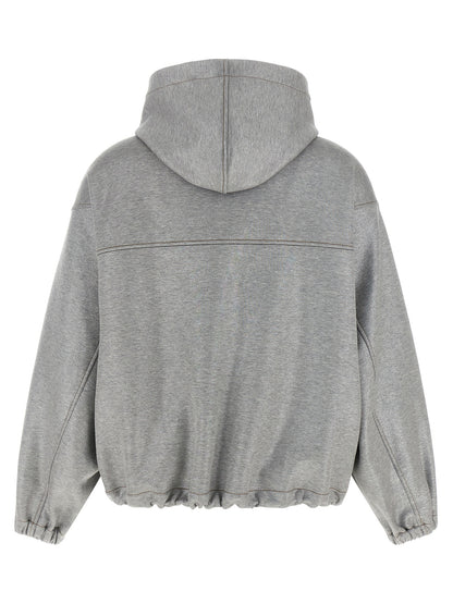 Hooded Bomber Jacket by Brunello Cucinelli for women in polyamide cotton silver showcases a bohemian silhouette, artfully detailed with a bohemian hooded high-neck neckline and signature hooded for a truly bohemian finish.