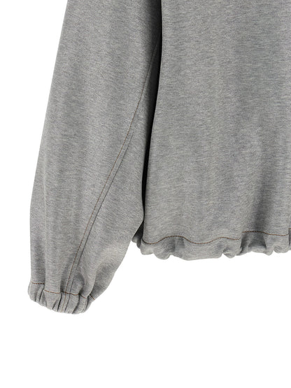 Hooded Bomber Jacket by Brunello Cucinelli for women in polyamide cotton silver features a dramatic silhouette, showcasing a sophisticated and distinctive hooded for a dramatic aesthetic.