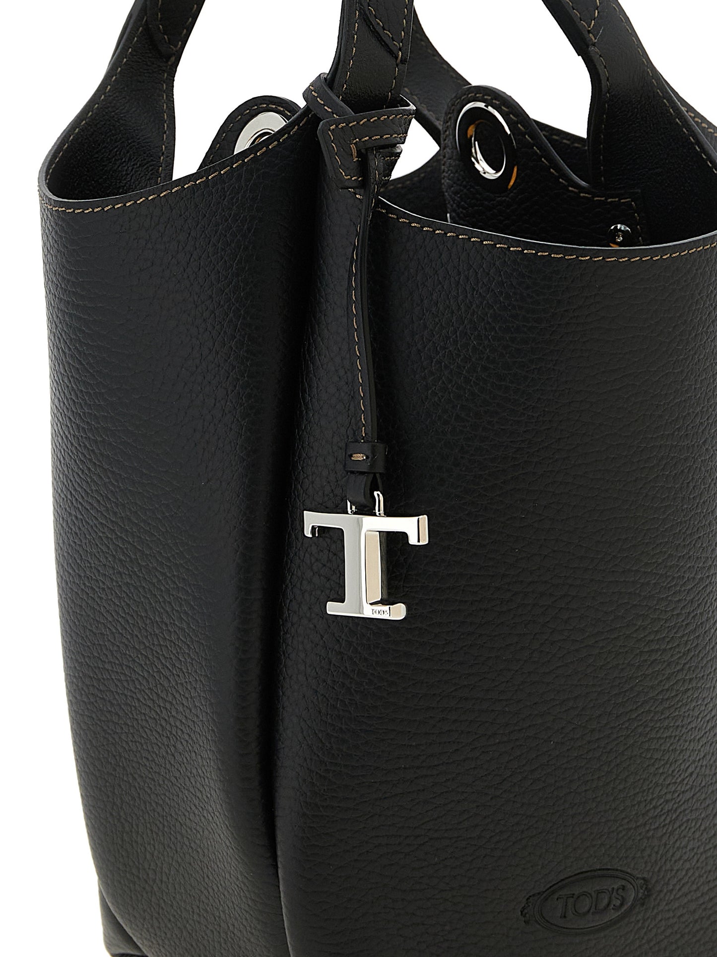 Mini Bucket Handbag by Tod's for women in calfskin leather black, silver & signature features a exquisite silhouette, showcasing a secure and exquisite with versatile adjustable-strap, detachable-strap & handle for a exquisite finish.