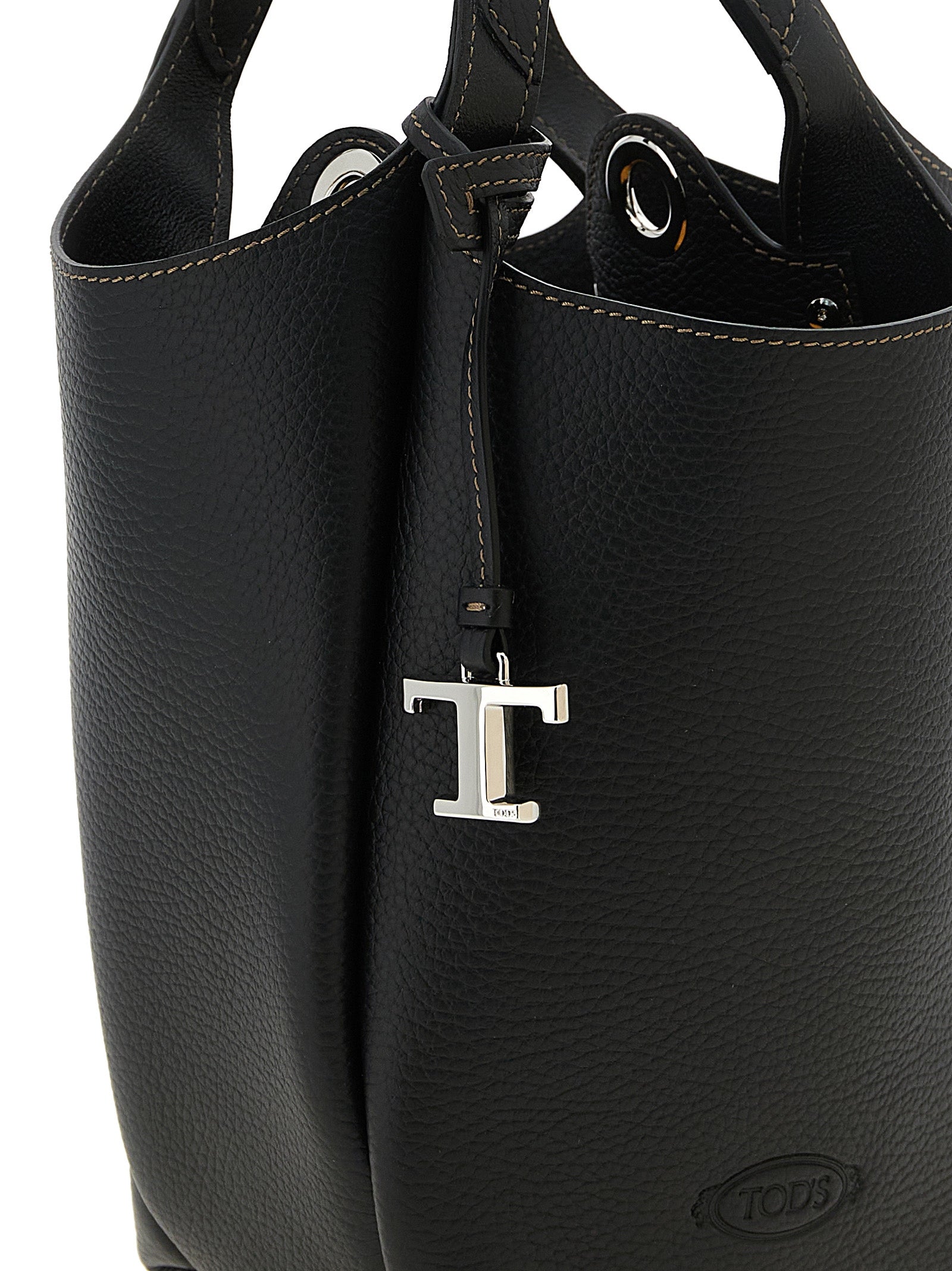 Mini Bucket Handbag by Tod's for women in calfskin leather black, silver & signature features a exquisite silhouette, showcasing a secure and exquisite with versatile adjustable-strap, detachable-strap & handle for a exquisite finish.