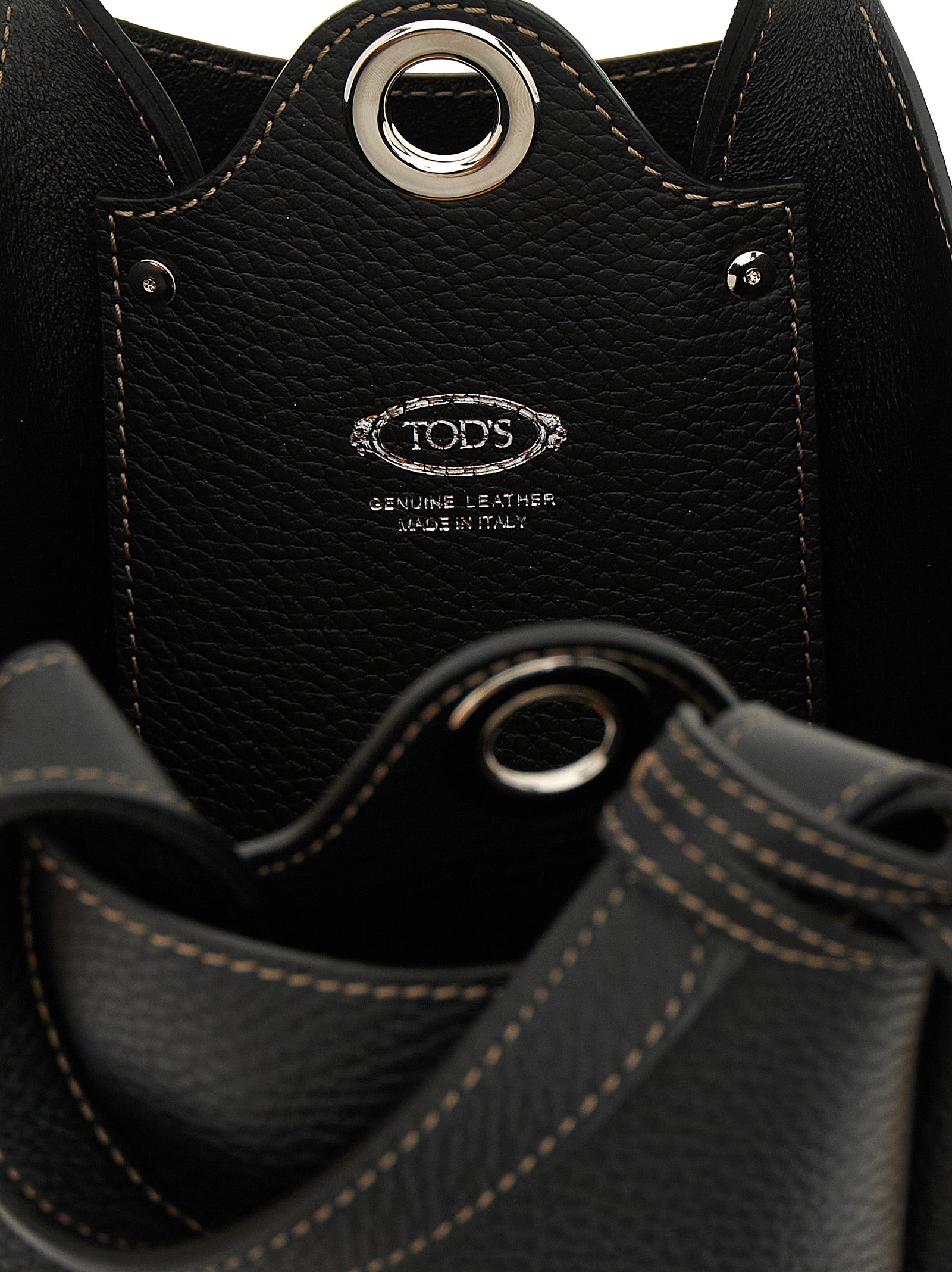Mini Bucket Handbag by Tod's for women in calfskin leather black, silver & signature features an refined silhouette, showcasing a secure , ample , and versatile adjustable-strap, detachable-strap & handle for a sophisticated refined aesthetic.