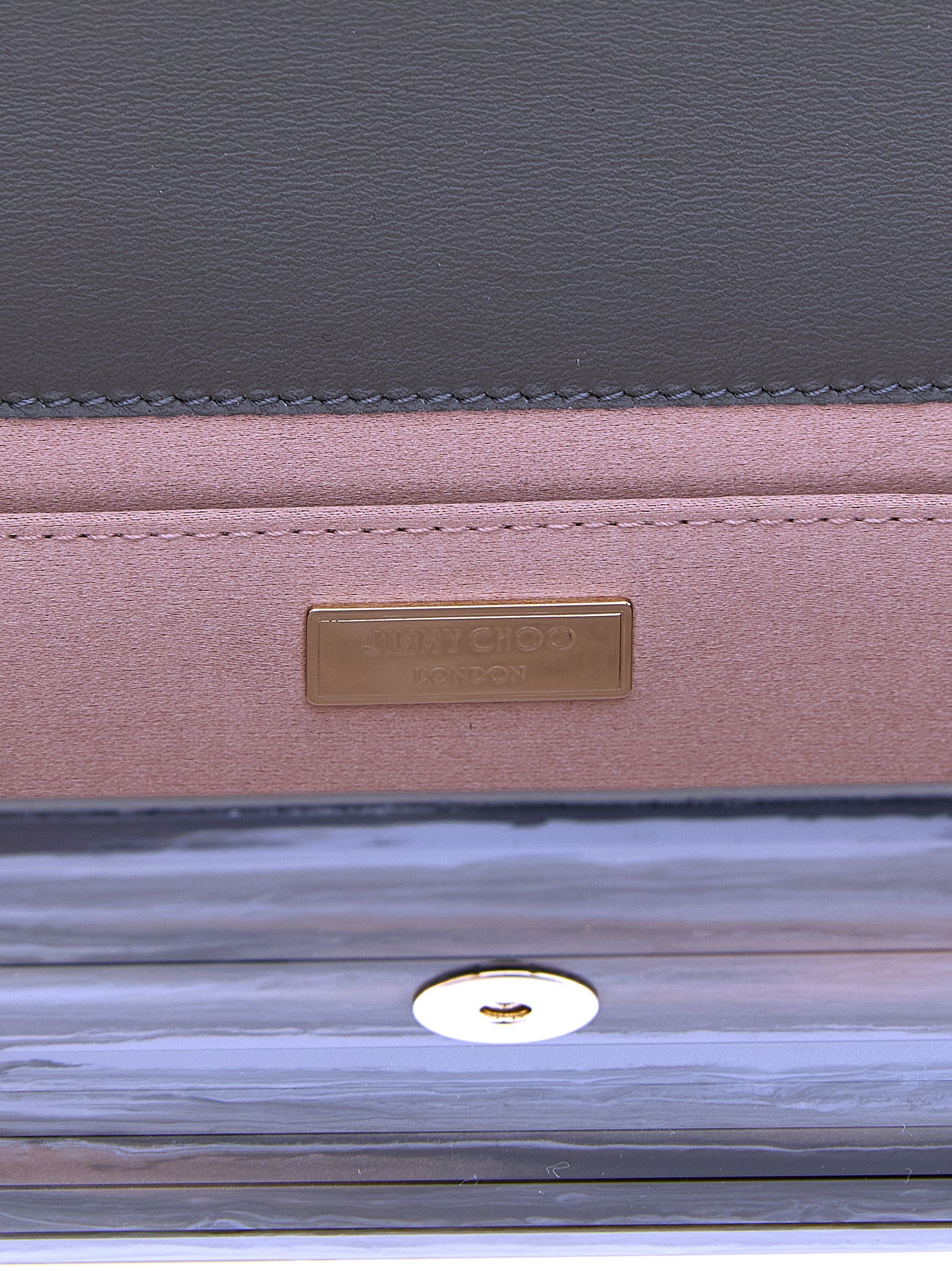 Evening Flap Clutch Handbag by Jimmy Choo for women in lambskin leather & marble gray & gold features a sculptural silhouette with a secure flap & magnetic, ample , and versatile for a sculptural finish.