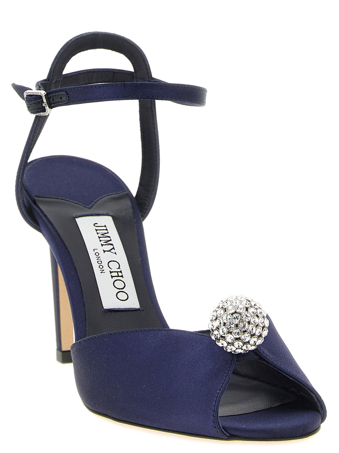 Stiletto Ankle Strap Sandals by Jimmy Choo for women in leather satin & crystal navy features an effortlessly chic silhouette from the Women's Leather Satin & Crystal Stiletto Ankle Strap Sandals collection, showcasing a effortlessly chic stiletto and elegant peep toe style.