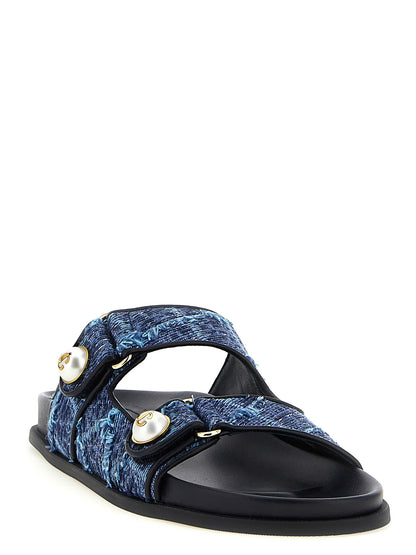 Sliders Sandals Flat Shoes by Jimmy Choo for women in denim blue, gold & pearl presents a impeccable silhouette as Women's Denim Sliders Sandals Flat Shoes, artfully designed with a and a impeccable for a refined, upscale finish.