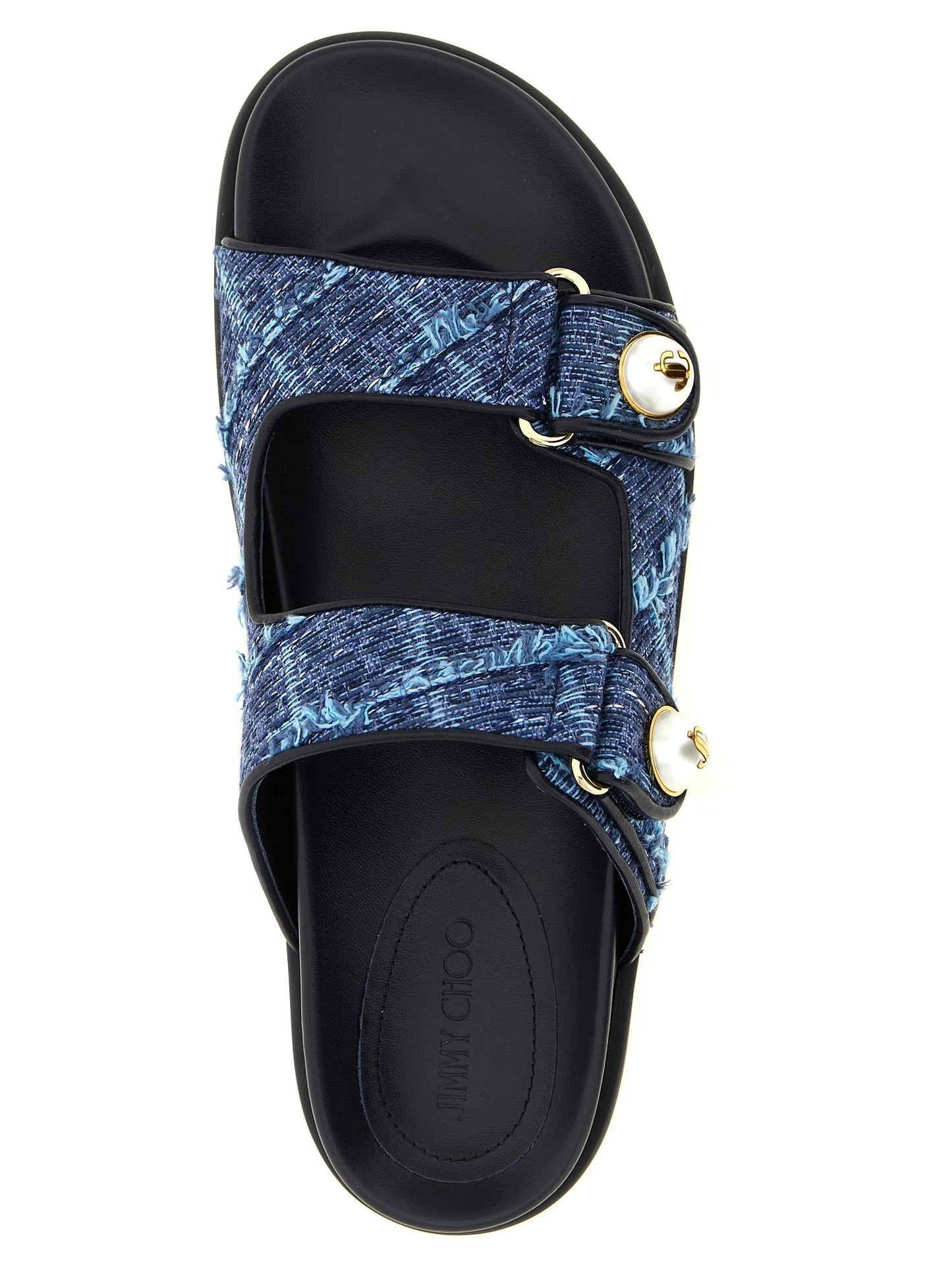 Sliders Sandals Flat Shoes by Jimmy Choo for women in denim blue, gold & pearl showcases a enchanting silhouette as part of the Women's Denim Sliders Sandals Flat Shoes collection, defined by a enchanting and for a enchanting look.