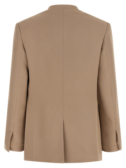 Blazer by Fabiana Filippi for women in linen twill viscose & acetate beige & camel presents a distinguished silhouette, detailed with a distinguished v-neck split lapel neckline and distinctive for a truly sophisticated finish.