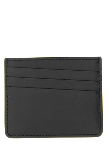 Cardholder Card Case by Maison Margiela for men in calfskin leather black, white & signature features a distinguished silhouette, showcasing the distinguished design of the Four Stitches Calfskin Leather Cardholder Card Case with refined card-organization compact-design.