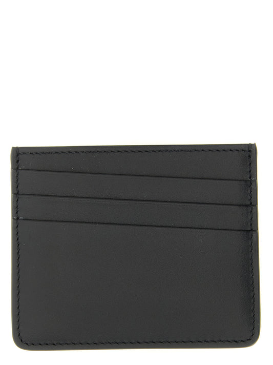 Cardholder Card Case by Maison Margiela for men in calfskin leather black, white & signature features a distinguished silhouette, showcasing the distinguished design of the Four Stitches Calfskin Leather Cardholder Card Case with refined card-organization compact-design.