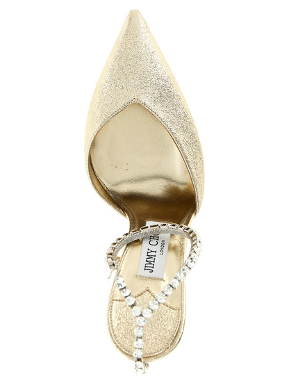 High-Heel Stiletto Pumps Heels by Jimmy Choo for women in plastic leather & crystal gold showcases a exquisite silhouette, perfectly accentuating Women's Plastic Leather & Crystal High-Heel Stiletto Pumps Heels with a exquisite stiletto high-heel and exquisite .