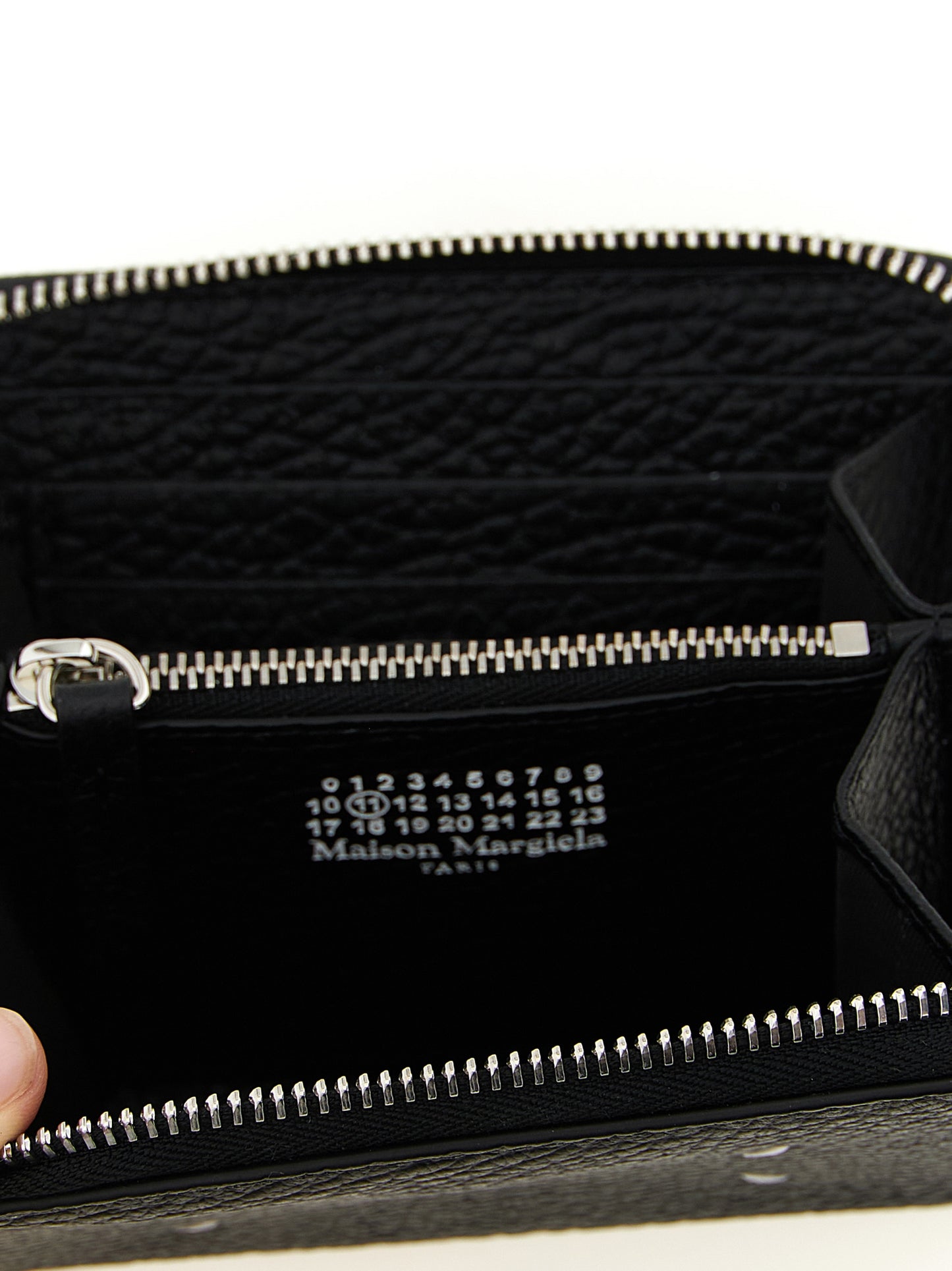 Cardholder Wallet by Maison Margiela for men in calfskin leather black & signature features a streamlined silhouette, showcasing the streamlined Four Stitches Calfskin Leather Cardholder Wallet design with sophisticated card-organization zip-around coin-purse for a premium look.