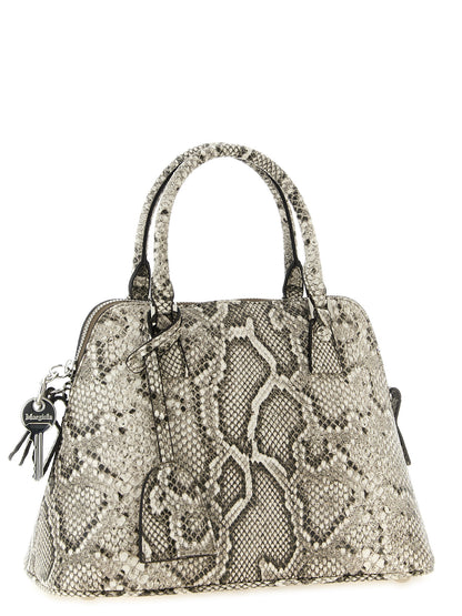 Mini Shoulder Bag by Maison Margiela for women in pvc & leather gray, silver, signature-print & print features a distinguished silhouette, showcasing a secure and distinguished with versatile shoulder-strap for a distinguished finish.