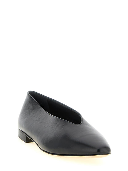 Ballet Flat Shoes by Jimmy Choo for women in plastic leather black & monogram showcases a dynamic silhouette, artfully capturing Women's Plastic Leather Ballet Flat Shoes through its distinctive and elegant .