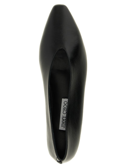 Ballet Flat Shoes by Jimmy Choo for women in plastic leather black & monogram showcases a enchanting silhouette as part of the Women's Plastic Leather Ballet Flat Shoes collection, defined by a enchanting and for a enchanting look.