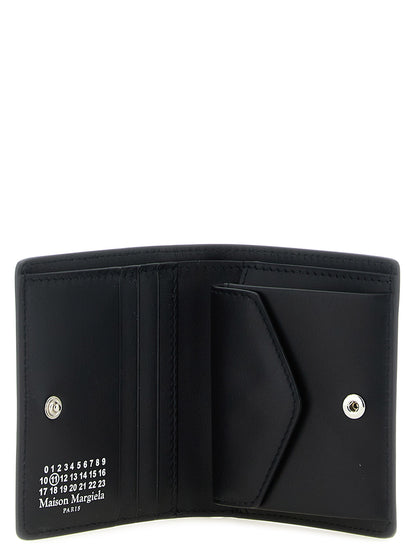 Cardholder Wallet by Maison Margiela for men in bos taurus calf suede leather black & signature presents a architectural silhouette from the Four Stitches Bos Taurus Calf Suede Leather Cardholder Wallet collection, showcasing architectural card-organization compact-design coin-purse for a architectural finish.