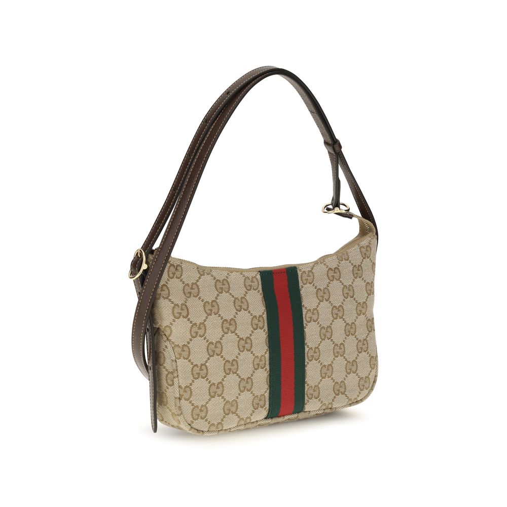 Small Shoulder Bag by Gucci for men in polyester polyamide leather & cotton beige, gold, green, red, patterned, signature & striped features a enviable silhouette, showcasing a secure zipper, ample , and enviable shoulder-strap, adjustable-strap, detachable-strap & handle for a enviable finish.
