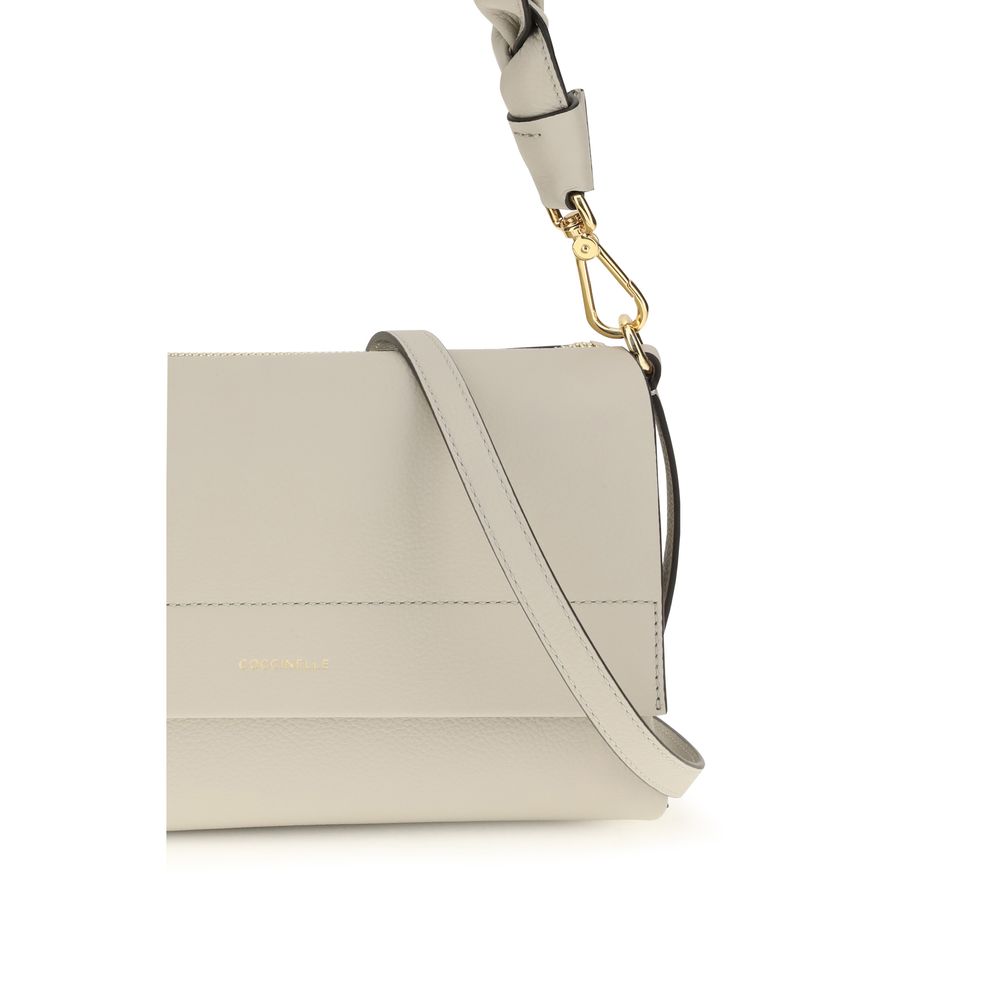 2-in-1 Shoulder & Crossbody Flap Bag by Coccinelle for women in bos taurus calf leather beige features a effortless chic silhouette with a secure flap, zipper & magnetic, ample external-pockets, and versatile crossbody-strap, shoulder-strap, adjustable-strap & handle for a effortless chic finish.