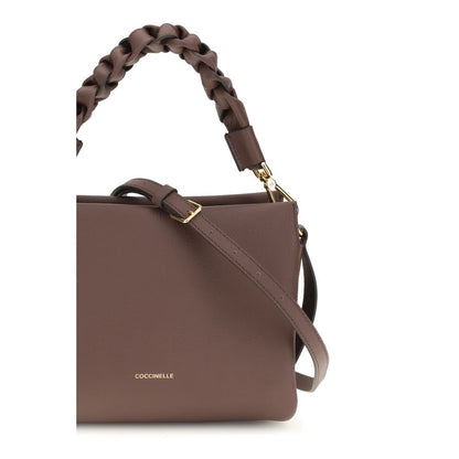 Crossbody Handbag by Coccinelle for women in bos taurus calf leather bicolour & signature features a signature silhouette, showcasing a secure and signature with versatile crossbody-strap, shoulder-strap, adjustable-strap & handle for a sophisticated look.
