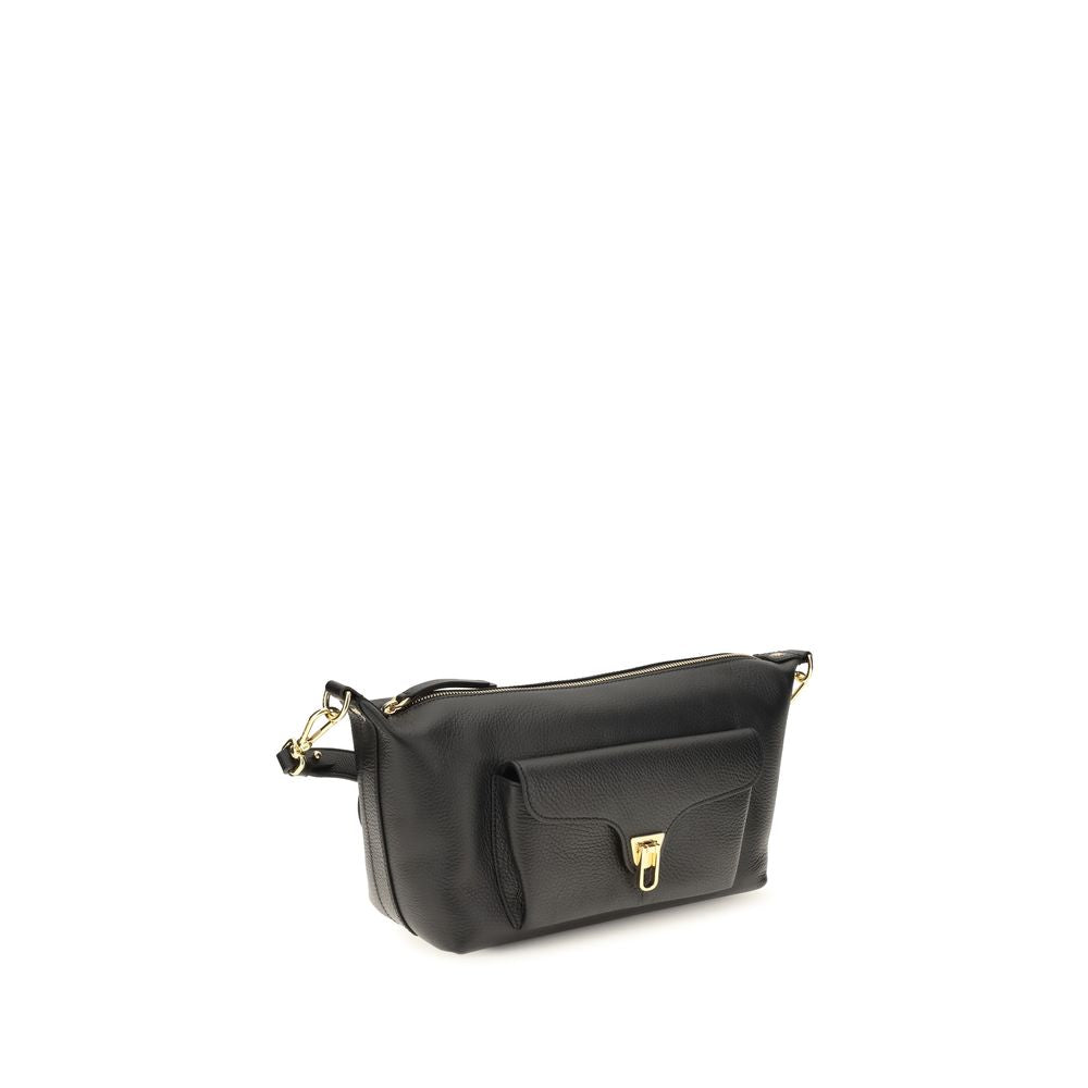 Shoulder Bag by Coccinelle for women in bos taurus calf leather black, gold & signature features a effortless sophistication silhouette, secured by a zipper with ample external-pockets and versatile shoulder-strap & adjustable-strap for a effortless sophistication finish.