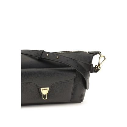 Shoulder Bag by Coccinelle for women in bos taurus calf leather black, gold & signature features a effortless chic silhouette with a secure zipper, ample external-pockets, and versatile shoulder-strap & adjustable-strap for a effortless chic finish.