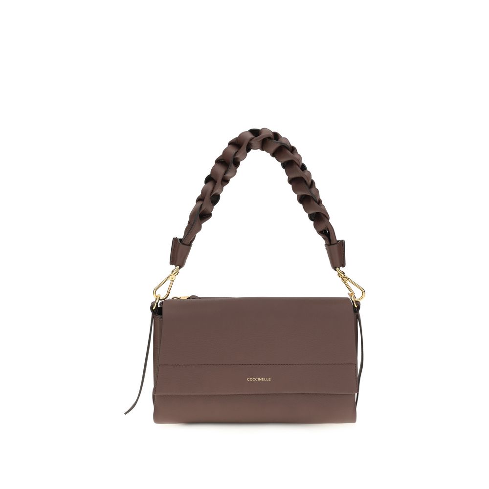 2-in-1 Shoulder & Crossbody Flap Bag by Coccinelle for women in bos taurus calf leather brown & signature features a effortless chic silhouette with a secure flap, zipper & magnetic, ample external-pockets, and versatile crossbody-strap, shoulder-strap, adjustable-strap & handle for a effortless chic finish.