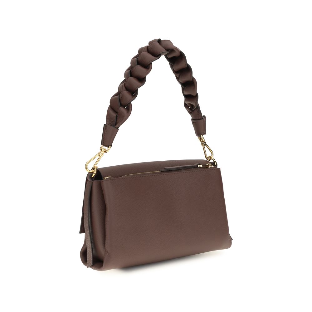 2-in-1 Shoulder & Crossbody Flap Bag by Coccinelle for women in bos taurus calf leather brown & signature features an effortlessly chic silhouette with a secure flap, zipper & magnetic, ample external-pockets, and versatile crossbody-strap, shoulder-strap, adjustable-strap & handle for effortlessly chic everyday luxury.