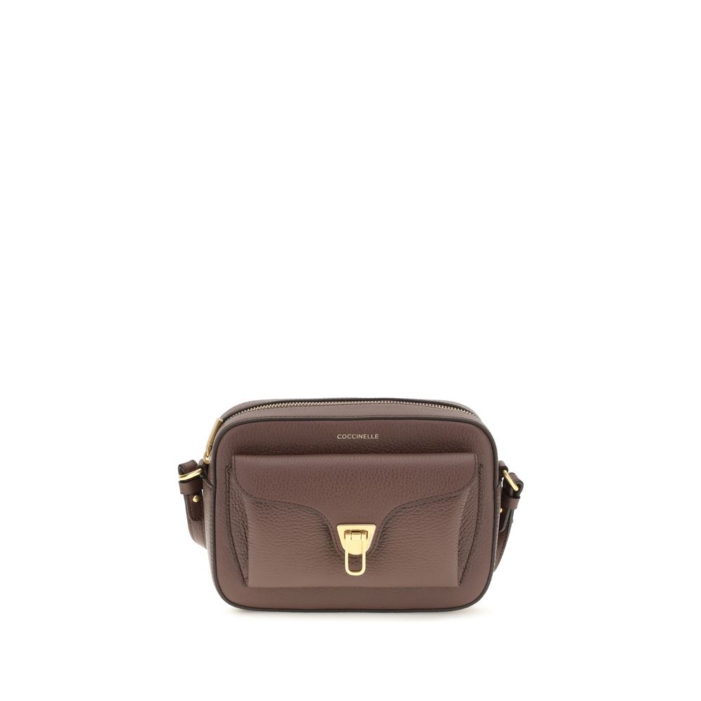 Shoulder Flap Bag by Coccinelle for women in bos taurus calfskin leather brown, gold & monogram presents a versatile silhouette, showcasing a secure flap & zipper and versatile with versatile shoulder-strap & adjustable-strap for a sophisticated look.