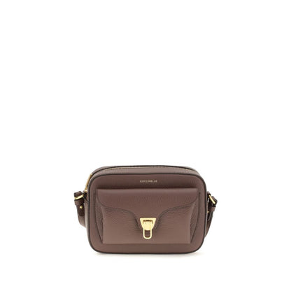 Shoulder Flap Bag by Coccinelle for women in bos taurus calfskin leather brown, gold & monogram presents a versatile silhouette, showcasing a secure flap & zipper and versatile with versatile shoulder-strap & adjustable-strap for a sophisticated look.