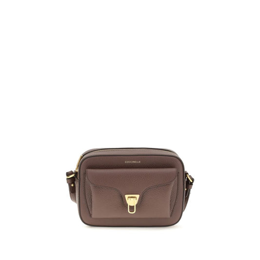 Shoulder Flap Bag by Coccinelle for women in bos taurus calfskin leather brown, gold & monogram presents a versatile silhouette, showcasing a secure flap & zipper and versatile with versatile shoulder-strap & adjustable-strap for a sophisticated look.