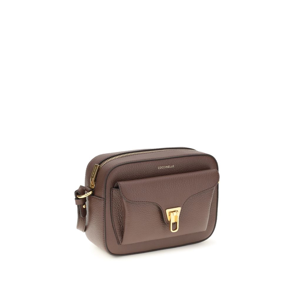 Shoulder Flap Bag by Coccinelle for women in bos taurus calfskin leather brown, gold & monogram features a enviable silhouette, showcasing a secure flap & zipper, ample , and enviable shoulder-strap & adjustable-strap for a enviable finish.