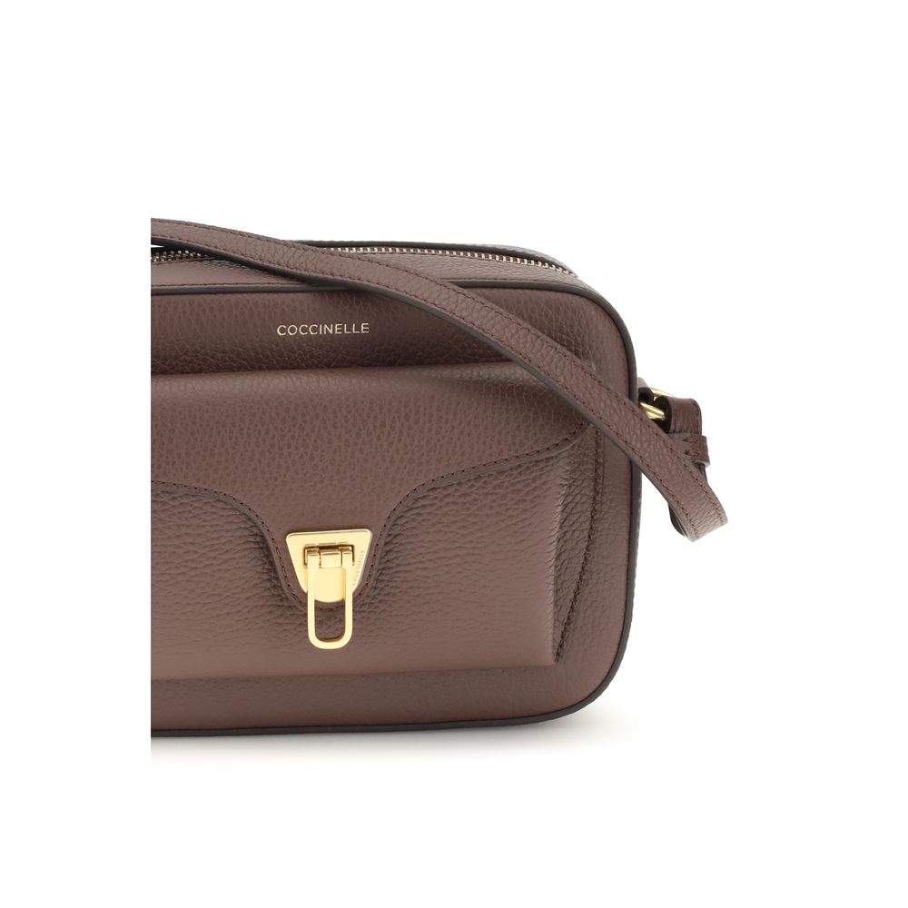 Shoulder Flap Bag by Coccinelle for women in bos taurus calfskin leather brown, gold & monogram features a effortless sophistication silhouette, secured by a flap & zipper with ample and versatile shoulder-strap & adjustable-strap for a effortless sophistication finish.
