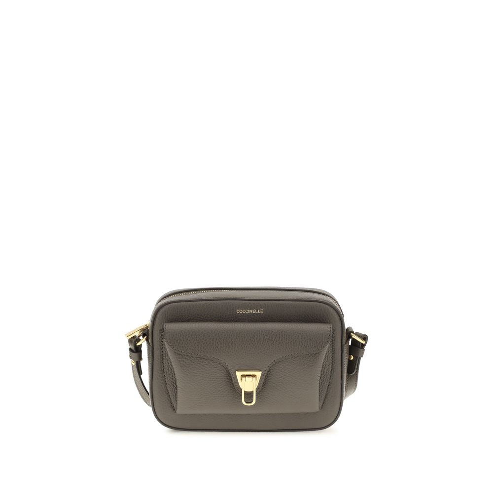 Shoulder Flap Bag by Coccinelle for women in bos taurus calfskin leather brown, gold & monogram features an effortlessly chic silhouette with a secure flap & zipper, ample , and versatile shoulder-strap & adjustable-strap for effortlessly chic everyday luxury.