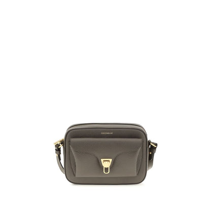 Shoulder Flap Bag by Coccinelle for women in bos taurus calfskin leather brown, gold & monogram features an effortlessly chic silhouette with a secure flap & zipper, ample , and versatile shoulder-strap & adjustable-strap for effortlessly chic everyday luxury.