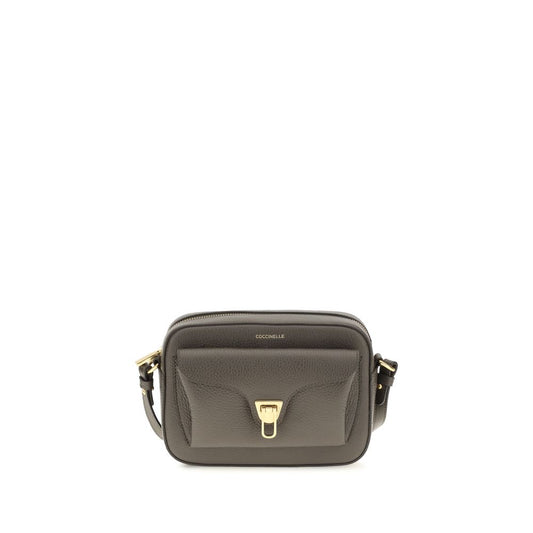 Shoulder Flap Bag by Coccinelle for women in bos taurus calfskin leather brown, gold & monogram features an effortlessly chic silhouette with a secure flap & zipper, ample , and versatile shoulder-strap & adjustable-strap for effortlessly chic everyday luxury.