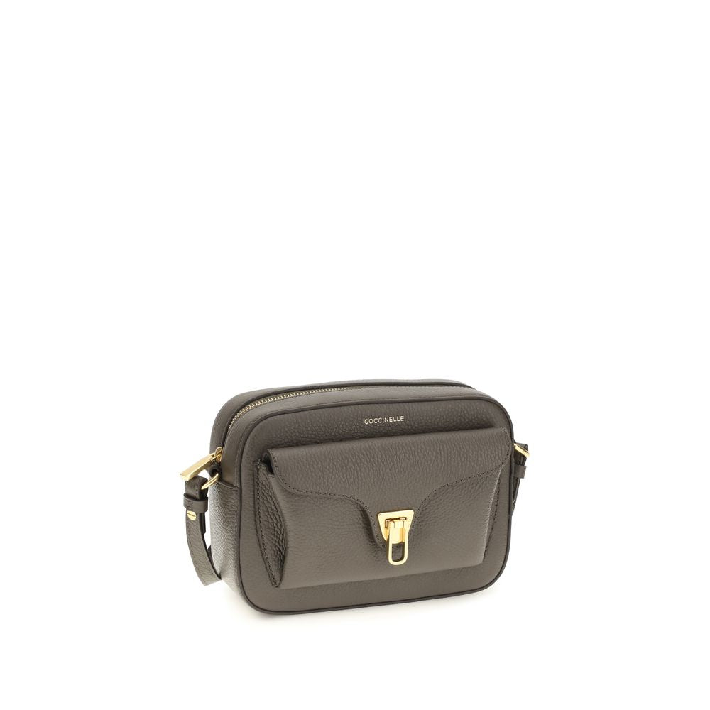 Shoulder Flap Bag by Coccinelle for women in bos taurus calfskin leather brown, gold & monogram showcases a enviable silhouette, artfully detailed with a secure flap & zipper, organized , and versatile shoulder-strap & adjustable-strap for a enviable look.