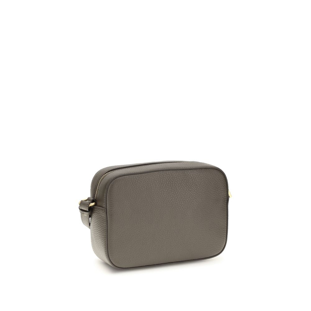 Shoulder Flap Bag by Coccinelle for women in bos taurus calfskin leather brown, gold & monogram features a distinguished silhouette, showcasing a secure flap & zipper and distinguished with versatile shoulder-strap & adjustable-strap for a distinguished finish.