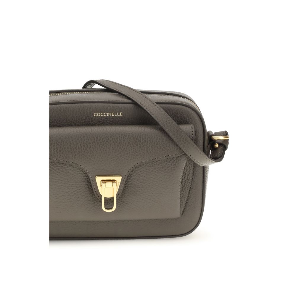 Shoulder Flap Bag by Coccinelle for women in bos taurus calfskin leather brown, gold & monogram features a effortless chic silhouette with a secure flap & zipper, ample , and versatile shoulder-strap & adjustable-strap for a effortless chic finish.